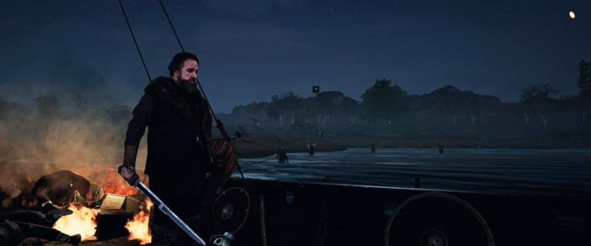 a man that is standing in the dark