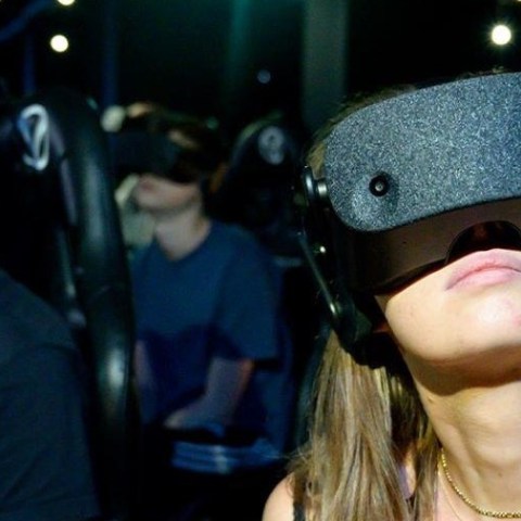 a person wearing VR experience glasses